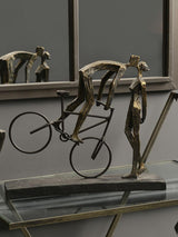 Libra Interiors Playful Kissing Couple on a Bike Sculpture - Metallic Bronze